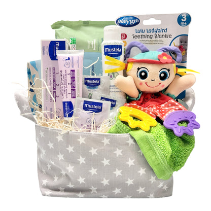Cesta regalo nacimiento bebé muñeca texturas