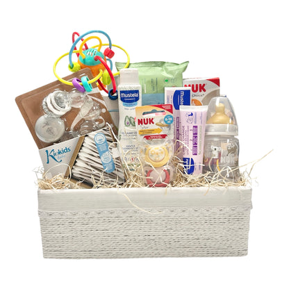 Cesta Regalo Nacimiento Bebé colorida— Mustela, Nuk & Kiokids